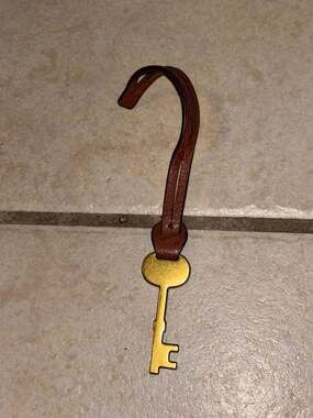 Fossil Brass Skeleton Key Bag Charm with Brown Leather Strap